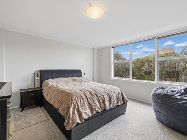 Desirable pied a terre in luscious tree top setting and secure undercover car space