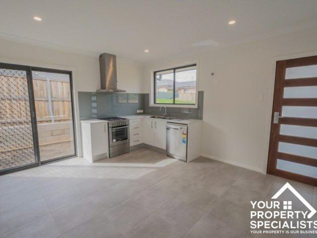 Detached modern two bedroom flat located in the Newbrook Estate