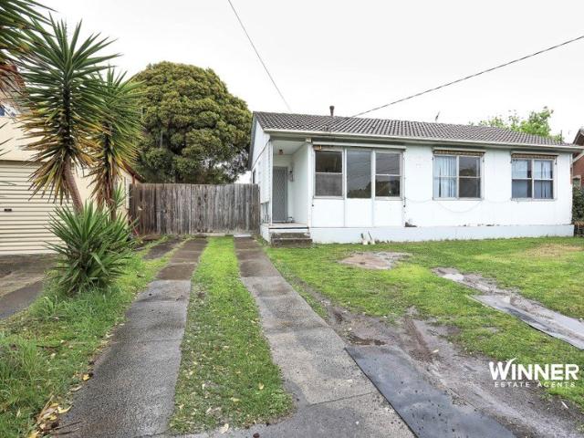 Developer's Dream: Prime Opportunity with Approved Plans!