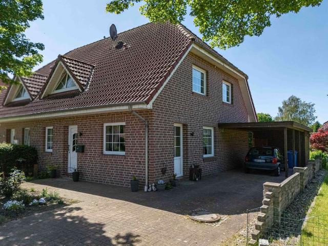 DHH in beliebter Lage von Aurich Schirum mit Terrasse & Carport