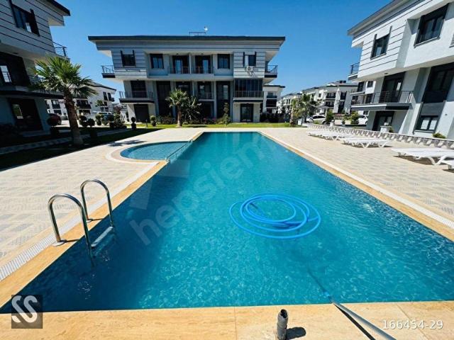 DİDİM MERKEZDE HAVUZLU SİTE İÇERİSİNDE SATILIK 2+1 LÜKS DAİRE