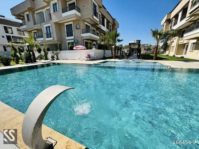 DİDİM MERKEZDE HAVUZLU SİTE İÇERİSİNDE 2+1 SATILIK DAİRE