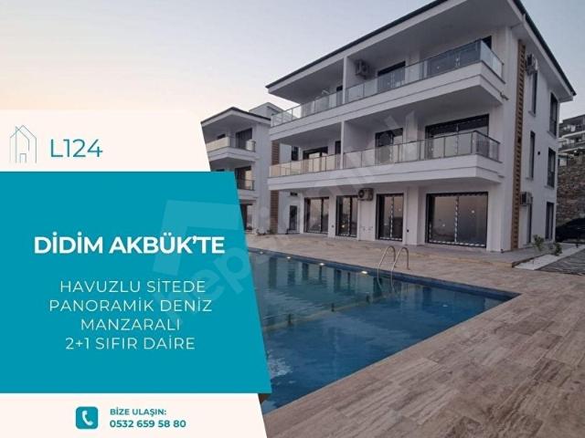 DİDİM AKBÜK'TE ÖNÜ KAPANMAZ DENİZ MANZARALI HAVUZLU SİTEDE 2+1 DAİRE