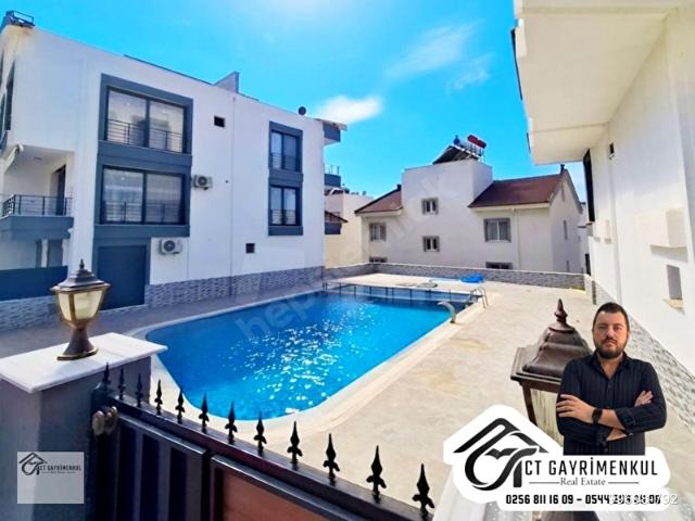 DİDİM'DE SATILIK 2+1 ORTA KAT SİTEDE HAVUZLU YOL CEPHE DENİZ MANZARALI SIFIR DAİRE