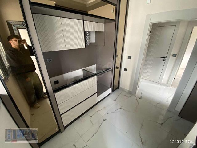 DİNÇ'TEN SATILIK MASRAFSIZ YÜKSEK GİRİŞ 2+1 LÜX YAPILI DAİRE