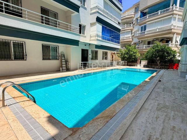 Didim Altınkum'da Havuzlu Sitede Eşyalı 3+1 Ara Kat Daire