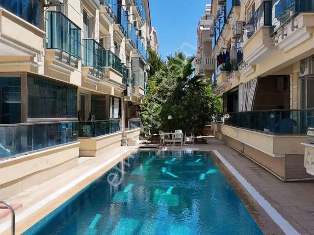Didim Kiralik Altınkum'un Kalbinde Havuzlu Sitede Kiralık Asansörlü 3+1 Dubleks Daire