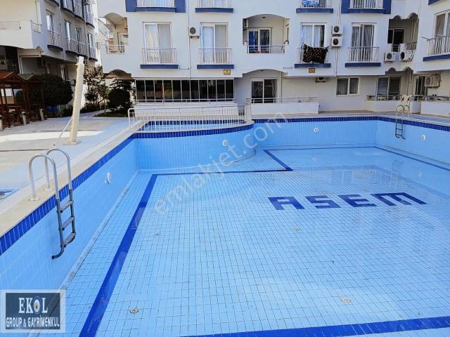 Didim Satılık Havuzlu Sitede Havuz Baṣı 1+1 Eşyalı Yazlık Daire