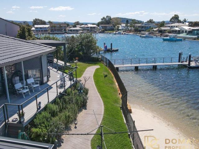 Direct Beachfront Lifestyle Opportunity with Jetty & Slipway