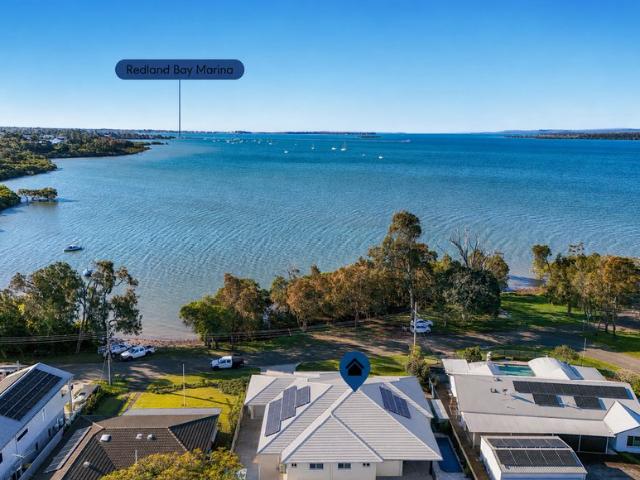 DIRECT WATERFRONT MODERN MASTER BUILT HOME