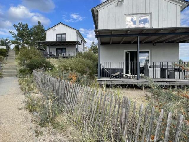 Direkt am Hainer See: Einfamilienhaus mit überdachter Terrasse in einzigartiger Wasserlage