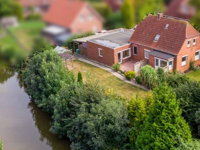 Direkte Kanallage: EFH mit Garage, sichtgeschütztem Garten und potenzieller Einliegerwohnung