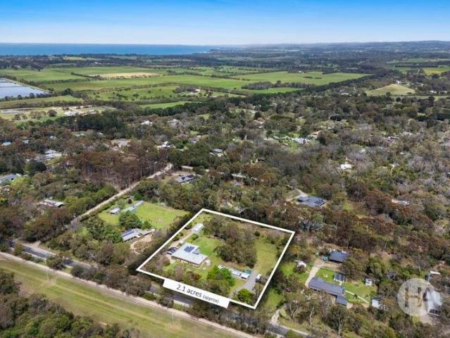 Distinguished Acreage with Immaculate Gardens