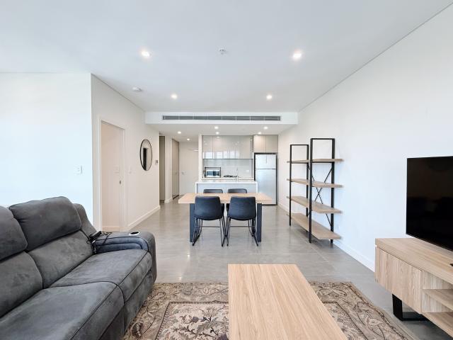 District Views with 180 Degree views from the balconies / Abundance of natural light with study / Fully furnished!