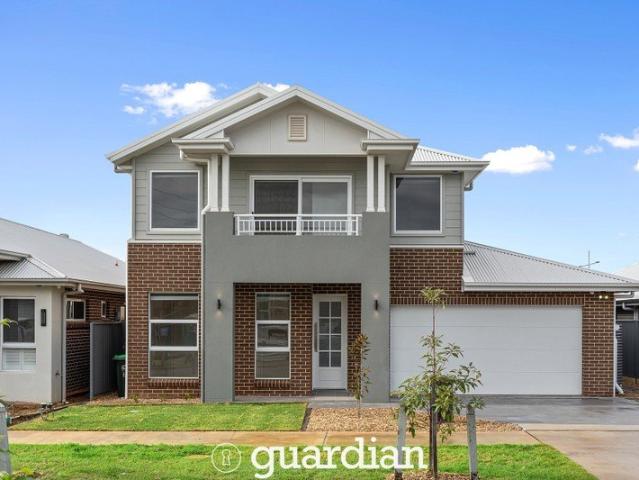 Discover the perfect blend of open living, modern design, and natural light at 16 Giovanni Street, Oran Park NSW 2570