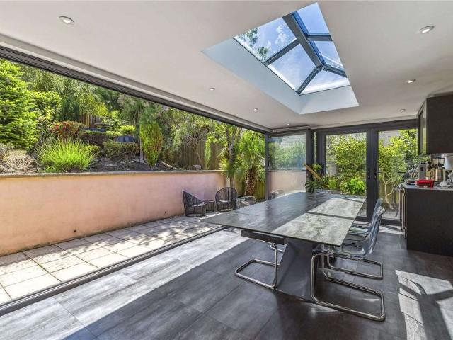 Discover this stunning four bedroom detached bungalow, perfectly positioned in an exclusive gated community, offering exceptional living spaces and breath taking coastal views