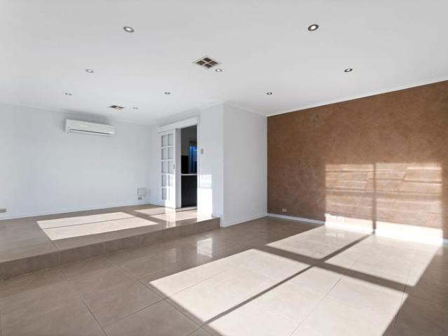 Discover a beautifully appointed family home where style, comfort and convenience come together