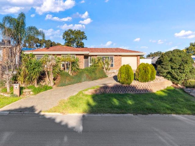 Discover a beautifully appointed family home where style, comfort and convenience come together