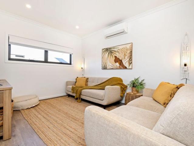 Discover a fresh rental opportunity in this modern, 2 year old two level townhome