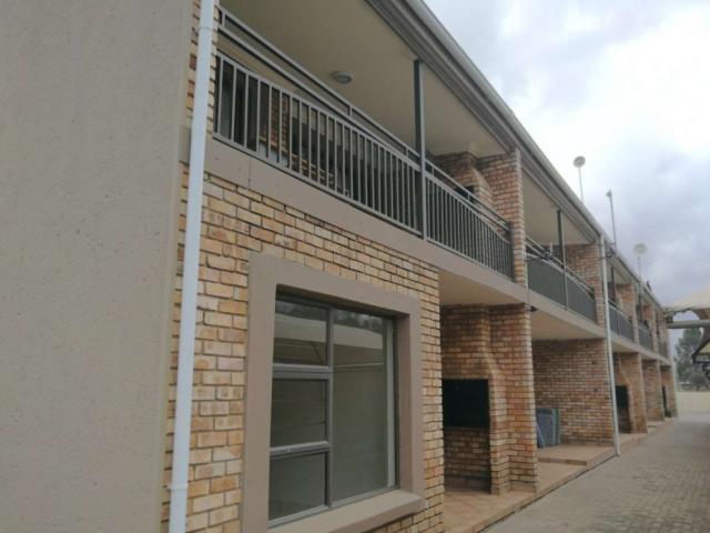 Discover a 1 Bedroom Apartment with Ample Storage and a Spacious Open Plan Kitchen/Living Area