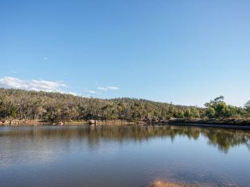 Discover Hill View Haven Over 315 Acres Private Paradise with Permanent Water on 3 Titles