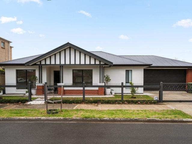 Discover modern comfort and style in this graciously appointed home