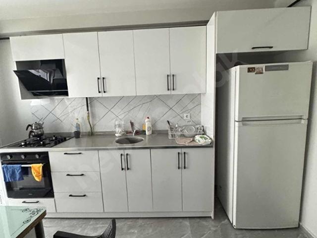 Diyarbakır caddesinde sıfır aile binası 1+1