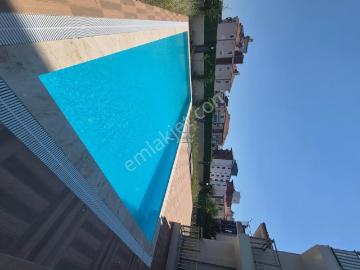 Döşemeaaltı Yeniköyde Belediye Yakını Full Eşyalı Kiralık Daire