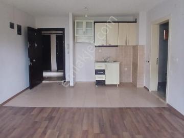 Döşemealtı Tokide Merkezi Konumda Arakat 1+1 Kiralık Daire