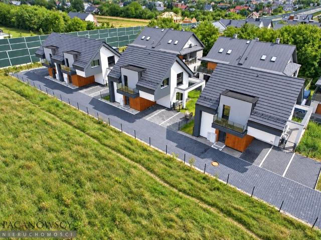 Do sprzedania nowoczesny dom 153 m² z tarasem i garażem