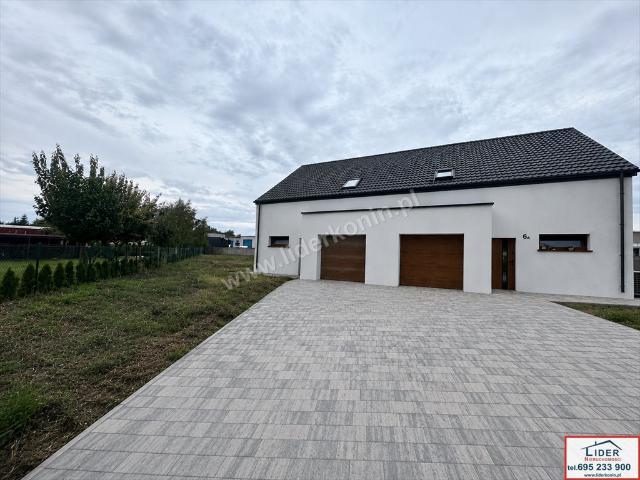 Do sprzedania nowoczesny dom 128 m² w Ruminie z garażem i dużym poddaszem
