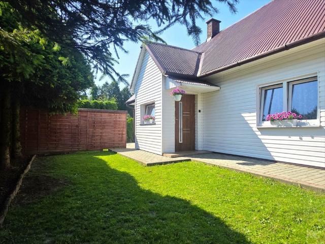 Do sprzedania dom 120 m² z garażami i działką 960 m²