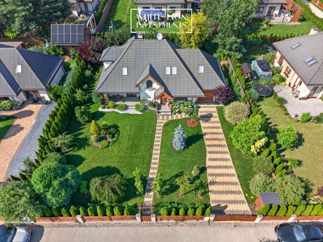 Do sprzedania luksusowy dom 214 m² z ogrodem i garażem