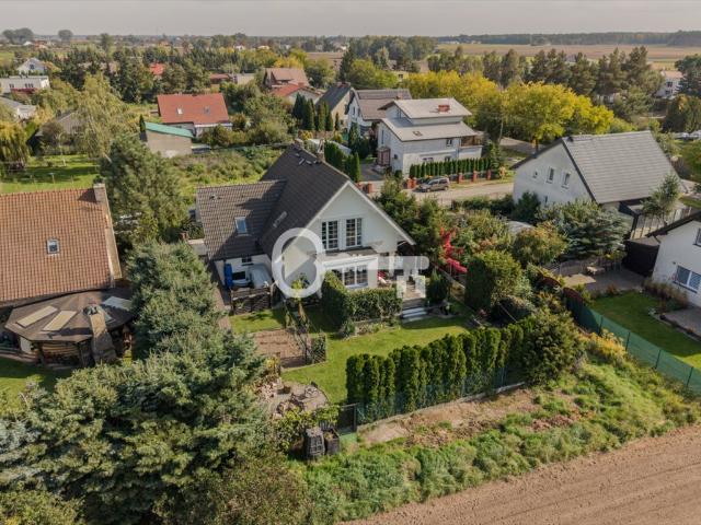 Do sprzedania przestronny dom 153 m² z ogrodem i garażem