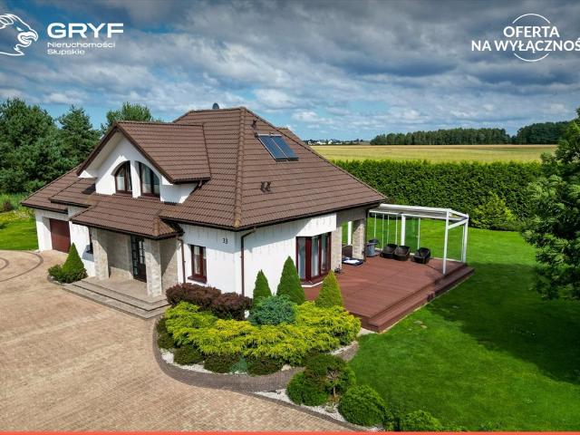 Do sprzedania przestronny dom 248 m² z dużym ogrodem w Bierkowie