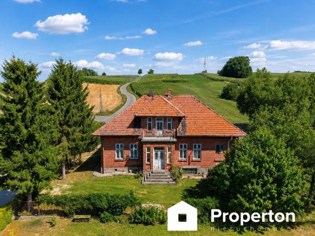 Do sprzedania przestronny dom z działkami 3231 m² w Tłuczańiu