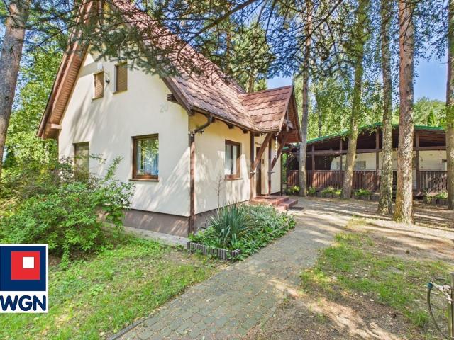 Do sprzedania urokliwy dom 68 m² nad jeziorem w Starym Dębcu