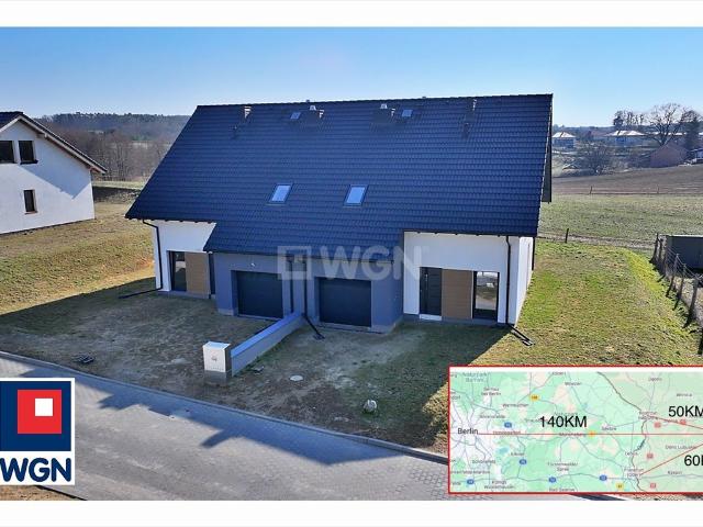 Nowoczesny dom bliźniak w stanie surowym zamkniętym, 149 m2, garaż