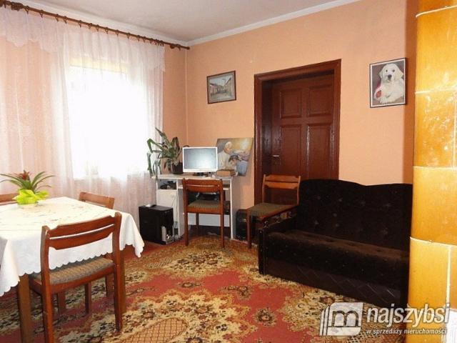 Dom do remontu 170 m2 z garażem i budynkiem gospodarczym