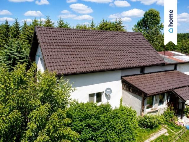 Dom dwurodzinny z 2 stawami i dużą działką