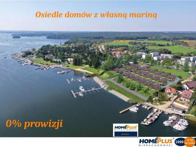 Dom nad Jeziorem Ryńskim z tarasem i miejscem na łódź