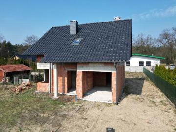 Dom w stanie surowym z garażem, 129,55 m2, własna aranżacja