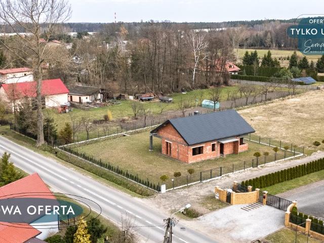 Dom w stanie surowym z dużą działką i potencjałem