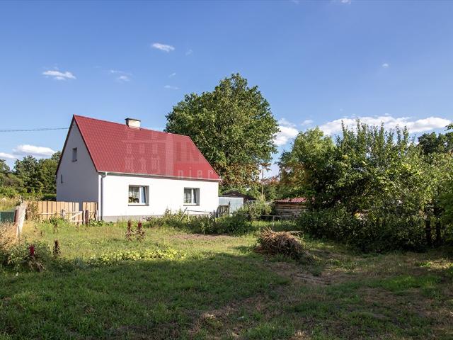 Dom wolnostojący z garażem i gruntami 13 arów zapraszam