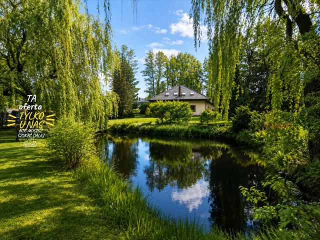 Dom wolnostojący z ogrodem i stawem 168 m² w Grodzisku