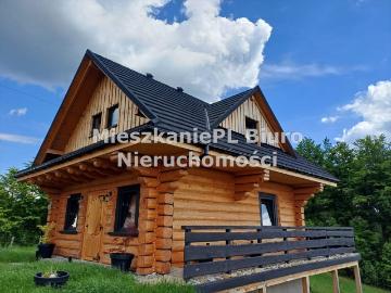 Urokliwy dom z bali 150 m² z tarasem i potencjałem inwestycyjnym