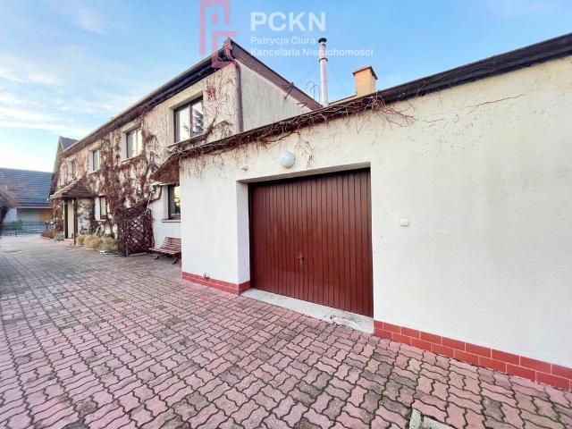 Dom z garażem i warsztatem w Malince, 202 m2