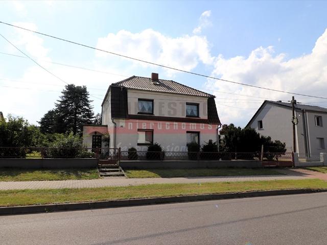 Dom z potencjałem dla 1 2 rodzin 180 m², działka 1173 m²