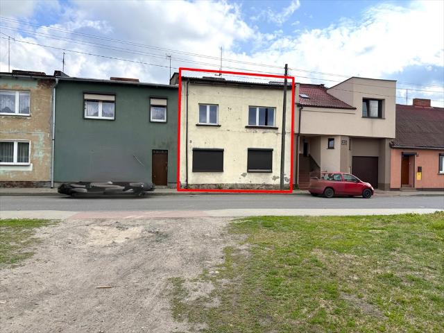 Dom z potencjałem inwestycyjnym w Rogoźnie, 113 m2