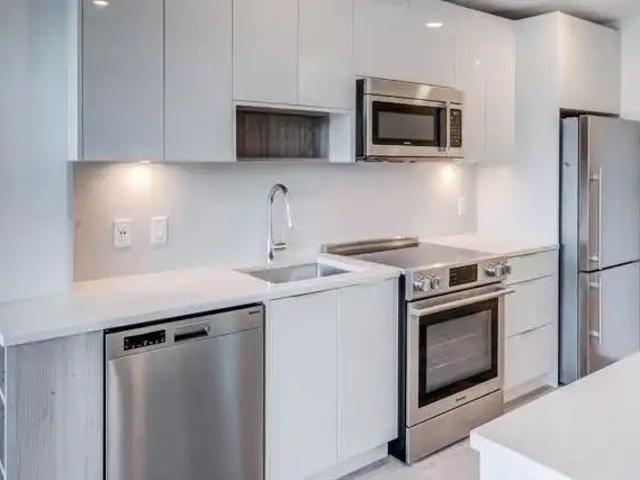 DOMINION YYC — 1505E